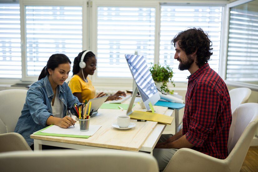group graphic designers working together 1170 1087