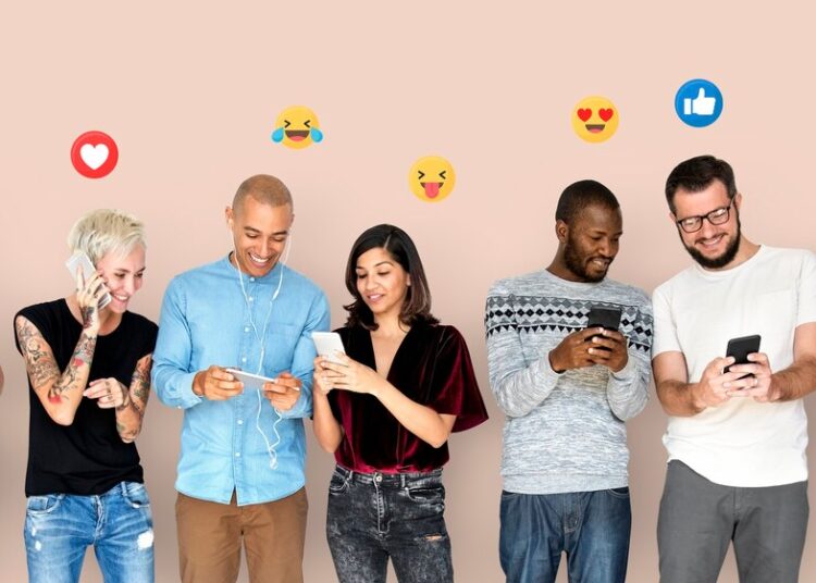 happy diverse people using digital devices 53876 96225