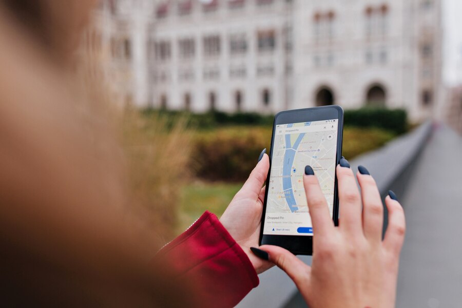 woman with trendy manicure using gps search right way 197531 6447